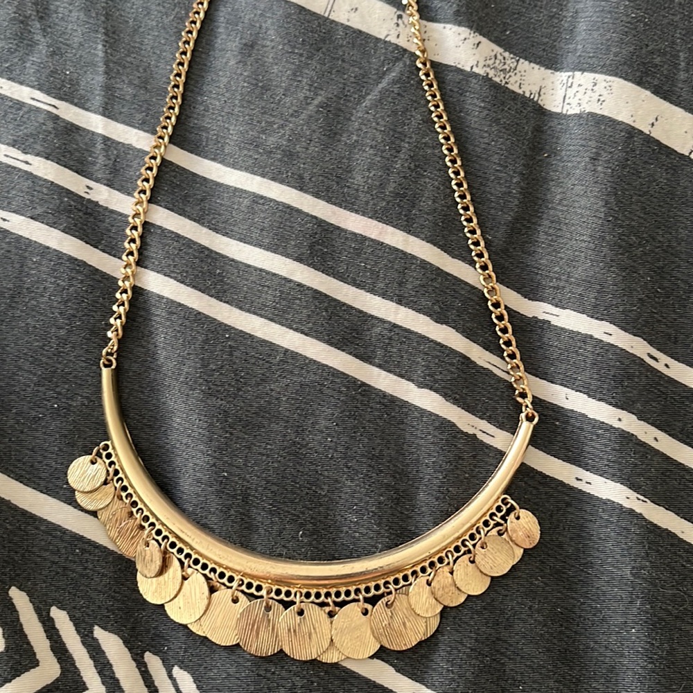 Gold colored necklace